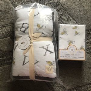 Burt’s Bees Baby Bee quilt and fitted crib sheet